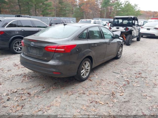 Photo 3 VIN: 1FADP3F20GL287488 - FORD FOCUS 