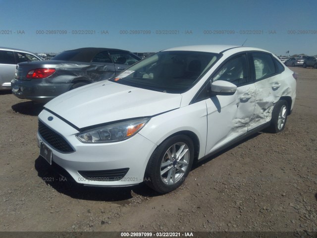 Photo 1 VIN: 1FADP3F20GL290424 - FORD FOCUS 