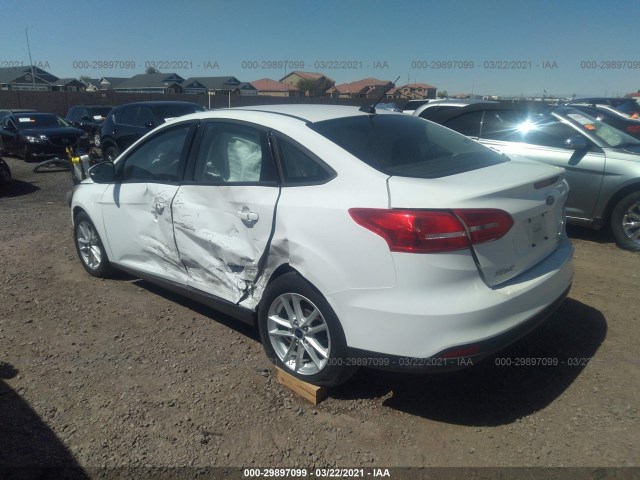 Photo 2 VIN: 1FADP3F20GL290424 - FORD FOCUS 