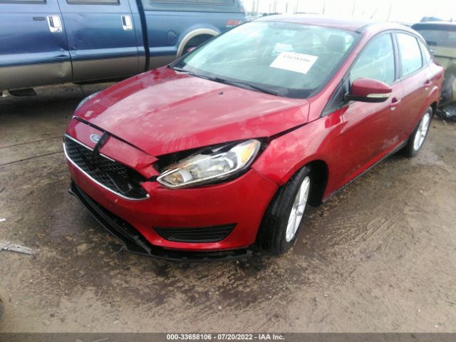 Photo 1 VIN: 1FADP3F20GL296661 - FORD FOCUS 