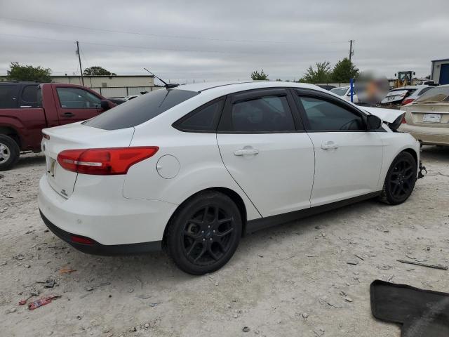 Photo 2 VIN: 1FADP3F20GL302099 - FORD FOCUS SE 