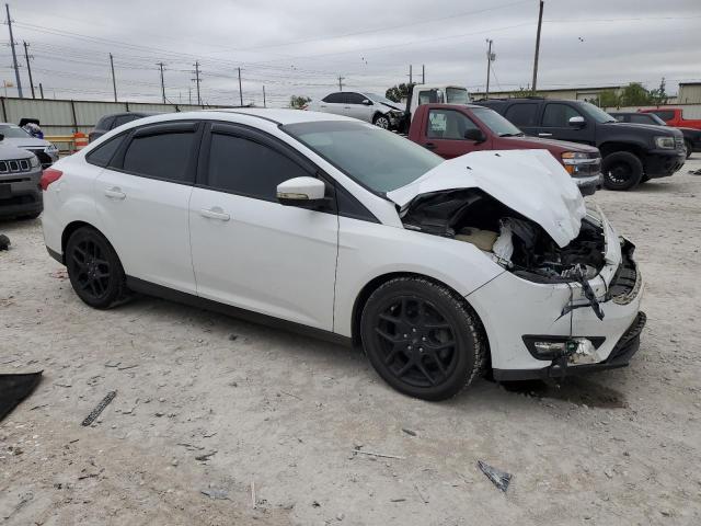 Photo 3 VIN: 1FADP3F20GL302099 - FORD FOCUS SE 