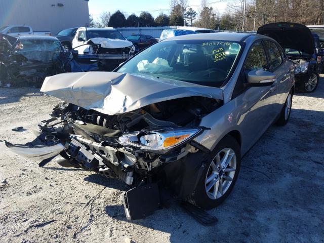 Photo 1 VIN: 1FADP3F20GL303916 - FORD FOCUS SE 