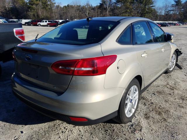 Photo 3 VIN: 1FADP3F20GL303916 - FORD FOCUS SE 