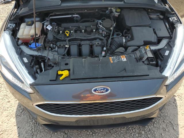 Photo 10 VIN: 1FADP3F20GL304080 - FORD FOCUS SE 