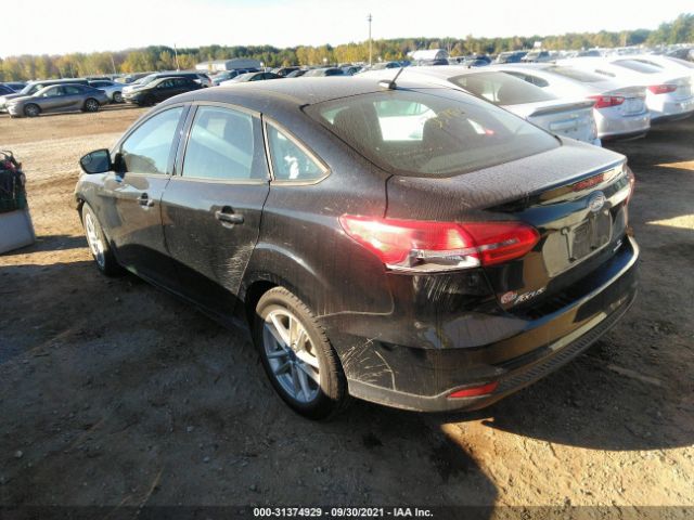 Photo 2 VIN: 1FADP3F20GL308016 - FORD FOCUS 