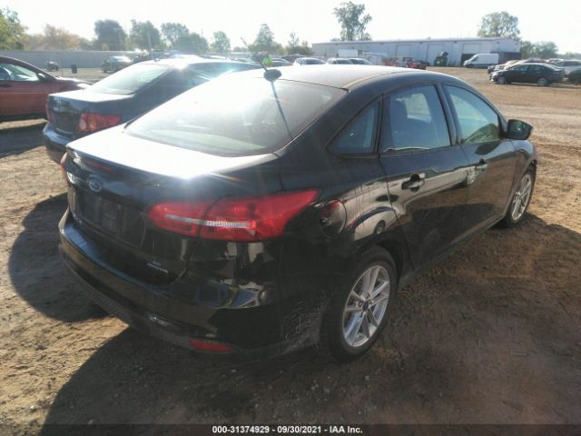 Photo 3 VIN: 1FADP3F20GL308016 - FORD FOCUS 