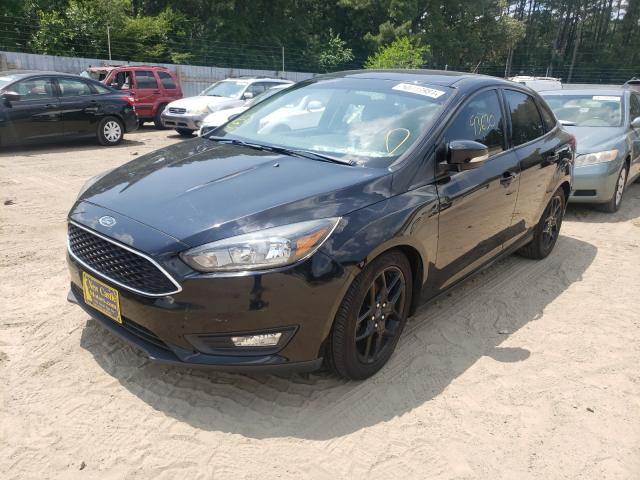 Photo 1 VIN: 1FADP3F20GL308632 - FORD FOCUS SE 