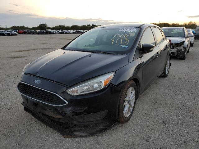 Photo 1 VIN: 1FADP3F20GL314852 - FORD FOCUS SE 