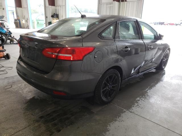 Photo 3 VIN: 1FADP3F20GL322076 - FORD FOCUS SE 