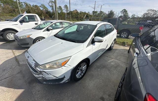 Photo 1 VIN: 1FADP3F20GL335460 - FORD FOCUS 