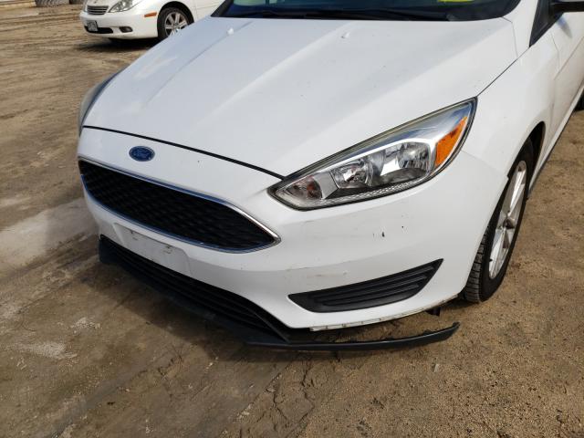 Photo 8 VIN: 1FADP3F20GL337581 - FORD FOCUS SE 