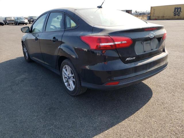 Photo 2 VIN: 1FADP3F20GL337709 - FORD FOCUS SE 