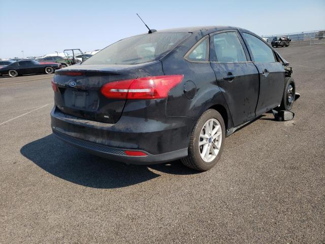 Photo 3 VIN: 1FADP3F20GL337709 - FORD FOCUS SE 