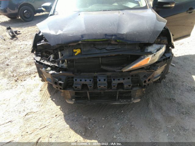 Photo 5 VIN: 1FADP3F20GL338259 - FORD FOCUS 