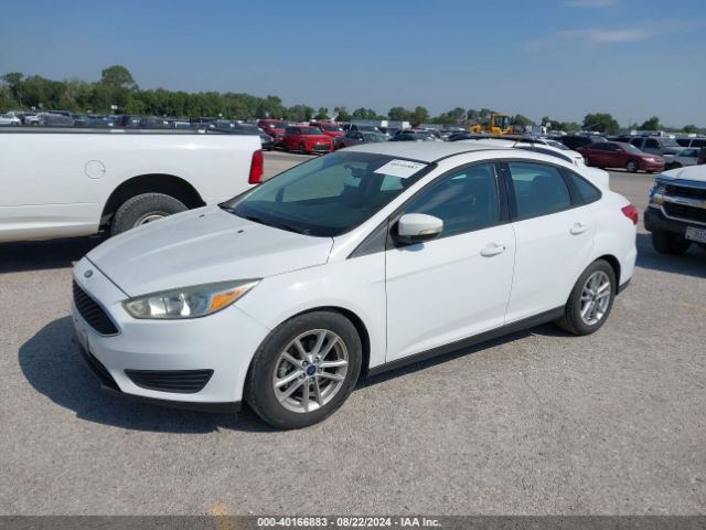 Photo 1 VIN: 1FADP3F20GL346491 - FORD FOCUS 