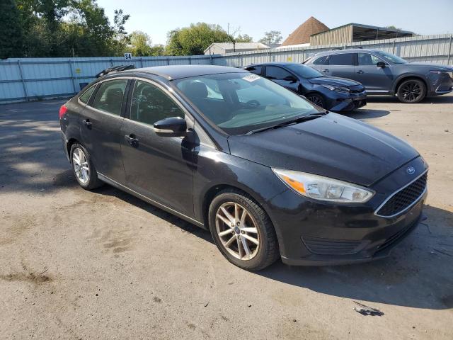 Photo 3 VIN: 1FADP3F20GL347799 - FORD FOCUS SE 