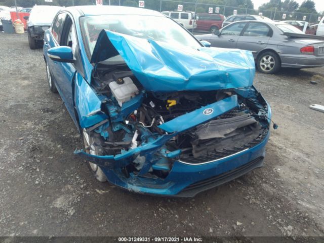 Photo 5 VIN: 1FADP3F20GL354526 - FORD FOCUS 