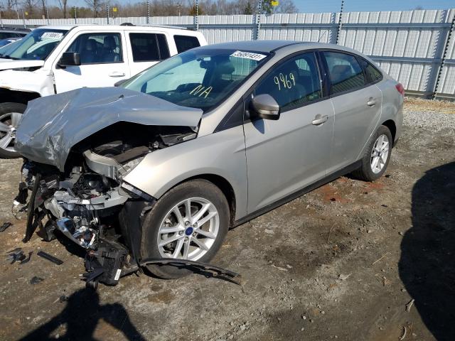 Photo 1 VIN: 1FADP3F20GL355322 - FORD FOCUS SE 