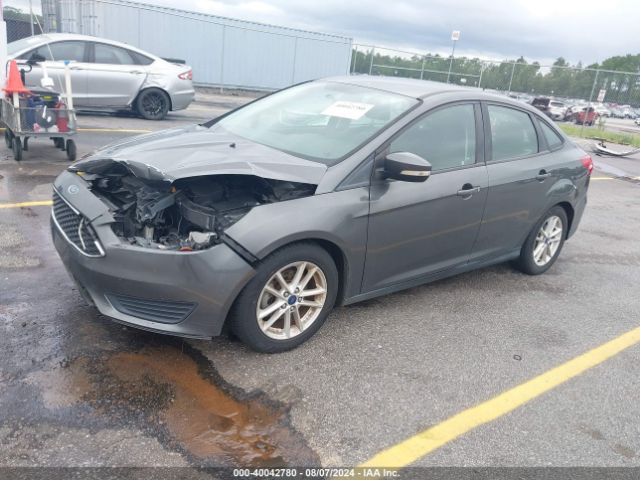 Photo 1 VIN: 1FADP3F20GL355787 - FORD FOCUS 