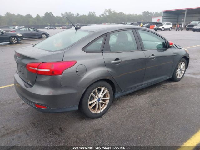 Photo 3 VIN: 1FADP3F20GL355787 - FORD FOCUS 