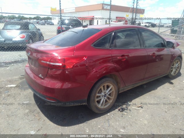 Photo 3 VIN: 1FADP3F20GL360102 - FORD FOCUS 