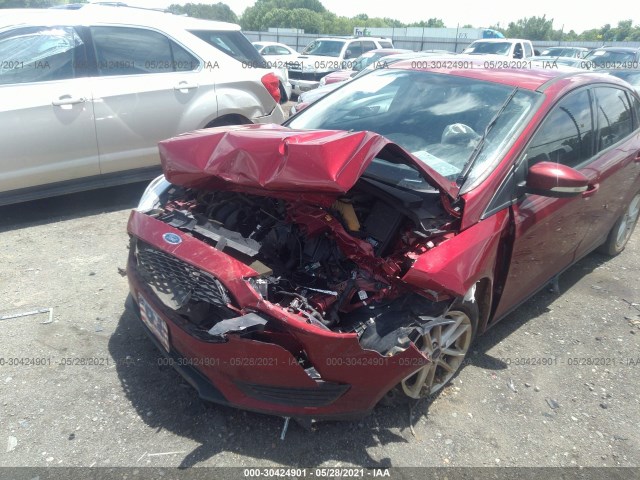 Photo 5 VIN: 1FADP3F20GL360102 - FORD FOCUS 