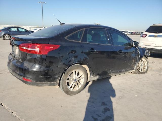 Photo 2 VIN: 1FADP3F20GL360584 - FORD FOCUS SE 