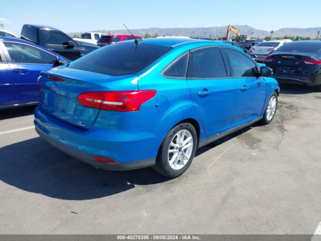 Photo 3 VIN: 1FADP3F20GL372735 - FORD FOCUS 