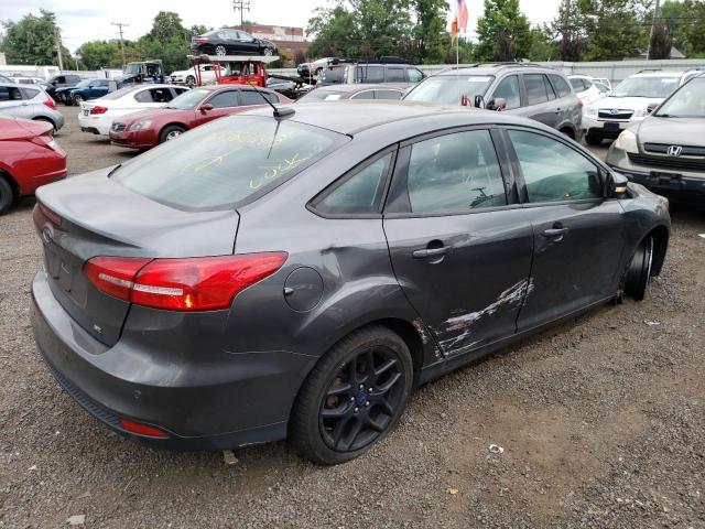 Photo 2 VIN: 1FADP3F20GL375750 - FORD FOCUS SE 