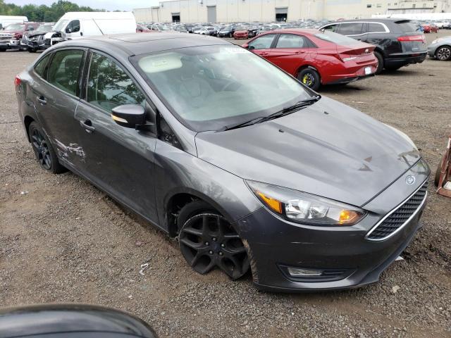 Photo 3 VIN: 1FADP3F20GL375750 - FORD FOCUS SE 