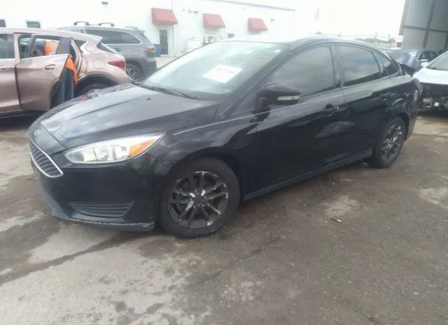 Photo 1 VIN: 1FADP3F20GL377014 - FORD FOCUS 