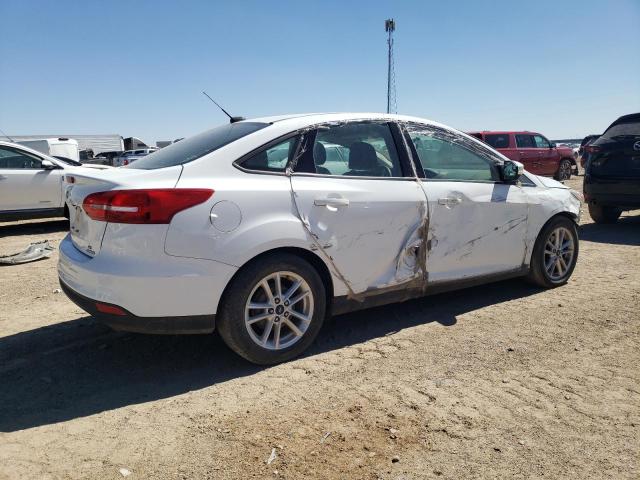 Photo 2 VIN: 1FADP3F20GL387171 - FORD FOCUS 