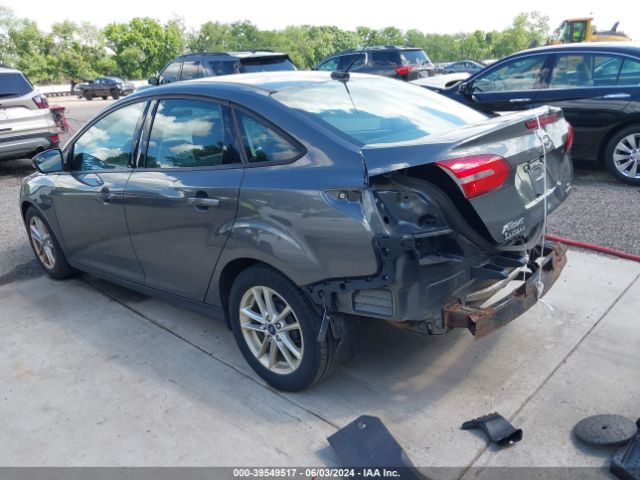 Photo 2 VIN: 1FADP3F20GL390541 - FORD FOCUS 