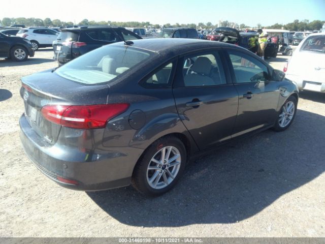 Photo 3 VIN: 1FADP3F20GL395142 - FORD FOCUS 