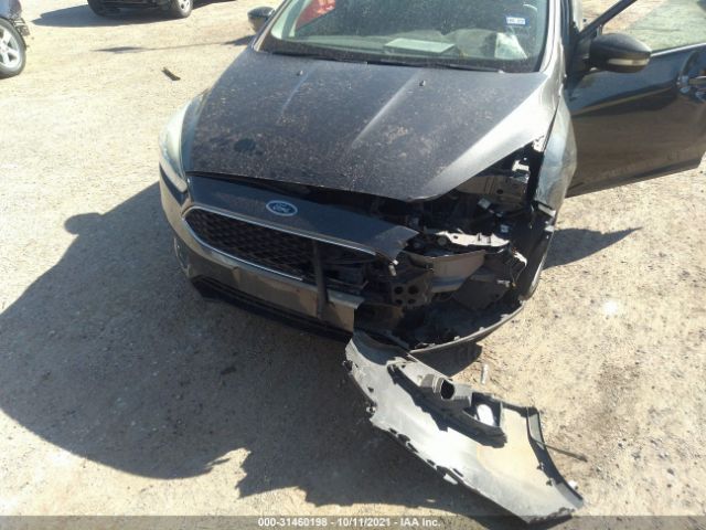 Photo 5 VIN: 1FADP3F20GL395142 - FORD FOCUS 