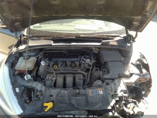 Photo 9 VIN: 1FADP3F20GL395142 - FORD FOCUS 