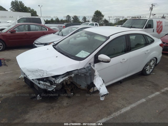 Photo 1 VIN: 1FADP3F20GL401909 - FORD FOCUS 