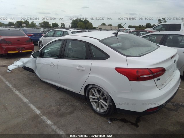 Photo 2 VIN: 1FADP3F20GL401909 - FORD FOCUS 