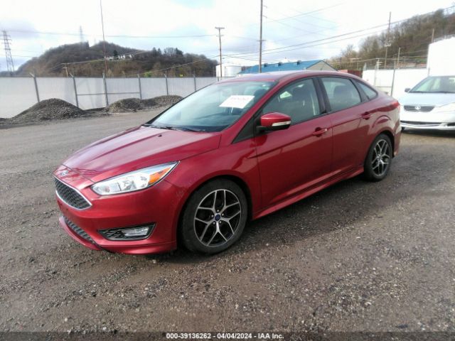 Photo 1 VIN: 1FADP3F20GL403482 - FORD FOCUS 