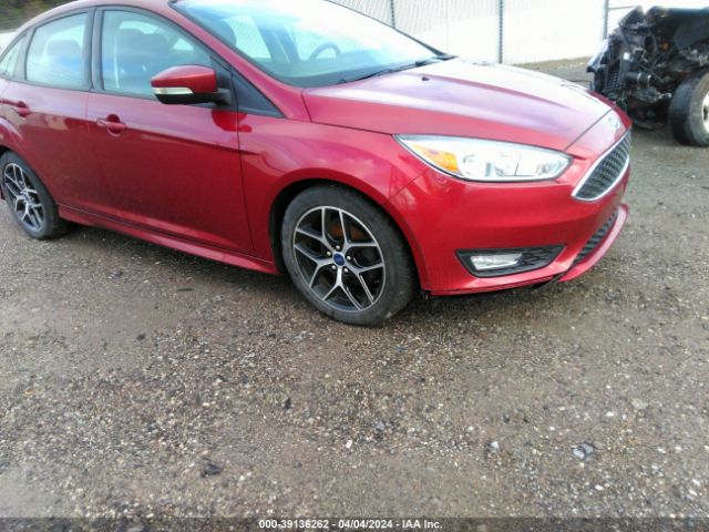 Photo 5 VIN: 1FADP3F20GL403482 - FORD FOCUS 