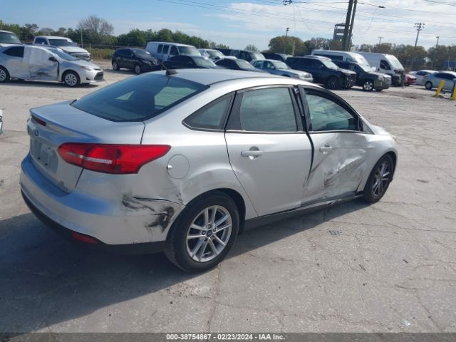 Photo 3 VIN: 1FADP3F20GL406639 - FORD FOCUS 