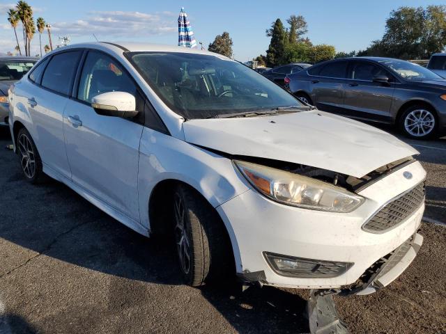 Photo 3 VIN: 1FADP3F20GL406981 - FORD FOCUS SE 