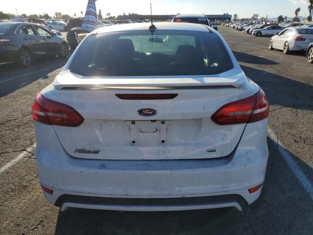 Photo 5 VIN: 1FADP3F20GL406981 - FORD FOCUS SE 