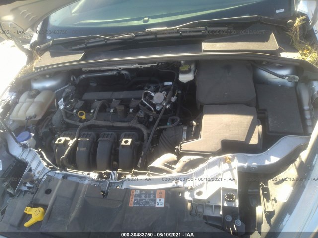 Photo 9 VIN: 1FADP3F20HL304274 - FORD FOCUS 