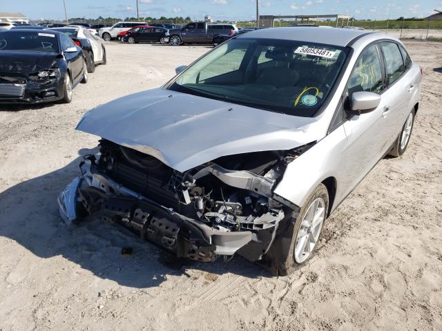 Photo 1 VIN: 1FADP3F20JL209056 - FORD FOCUS 