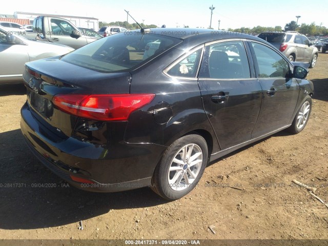 Photo 3 VIN: 1FADP3F20JL209851 - FORD FOCUS 