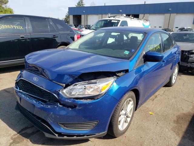 Photo 1 VIN: 1FADP3F20JL212149 - FORD FOCUS SE 