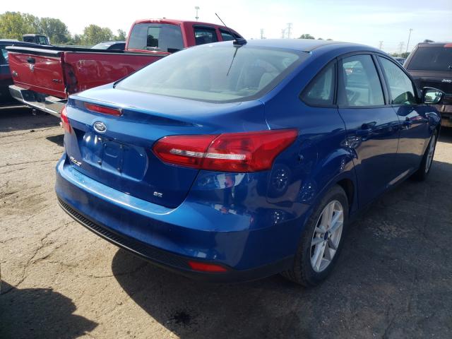 Photo 3 VIN: 1FADP3F20JL212149 - FORD FOCUS SE 