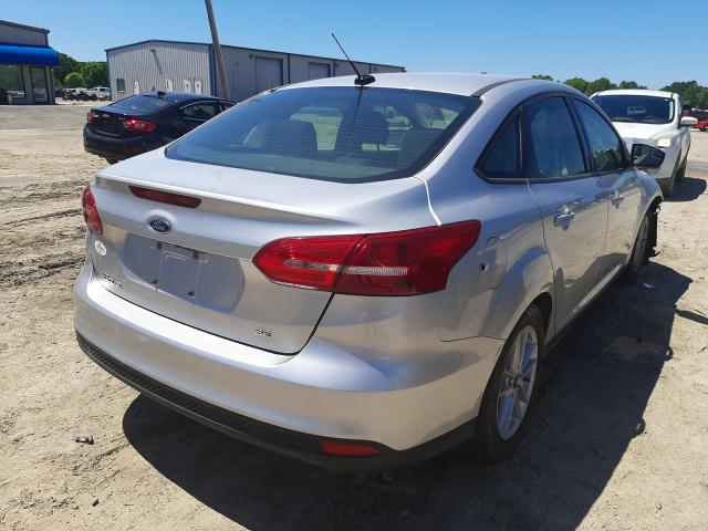 Photo 3 VIN: 1FADP3F20JL235964 - FORD FOCUS SE 